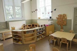 the new room is bright with wooden furnishings
