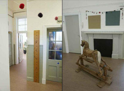 A ruler for children to measure their height and a rocking horse in the corridors