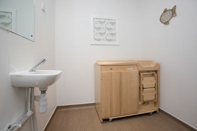 Bathroom with a nappy changing unit