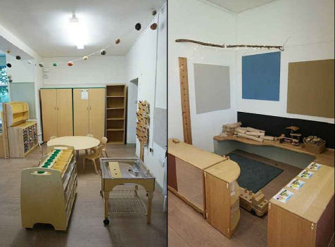 A natural palette and display boards, a branch with fairy lights hangs from the ceiling