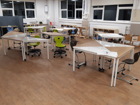 Trialling triangular desks that can create different shaped surface space