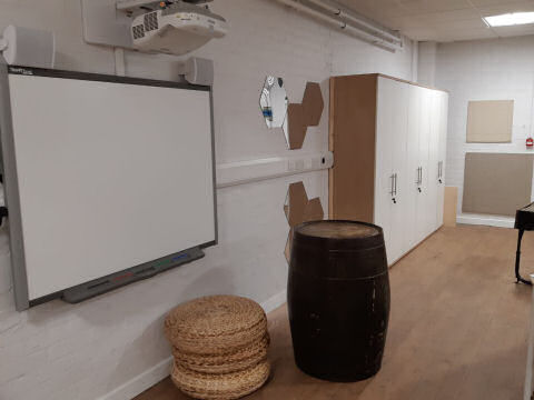 A barrel for a laptop stand ties in with the nautical theme