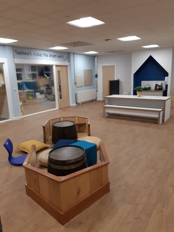 the general purpose space has a boat to sit in and a large collaborative work bench