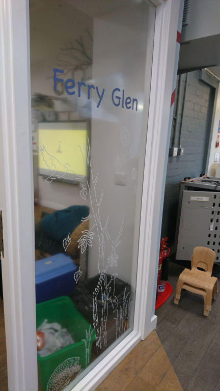 The woodland illustration on the Ferry Glen classroom window