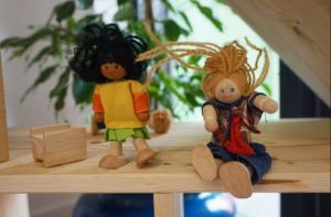 Wooden toys for a dolls house, two wooden people