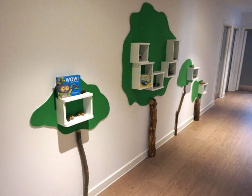 Cube shelves wall mounted on the decorative trees