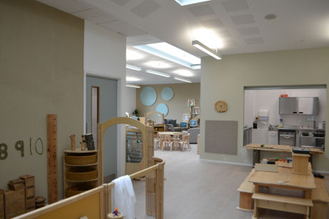 the nursery has a dining area with a kitchen.
