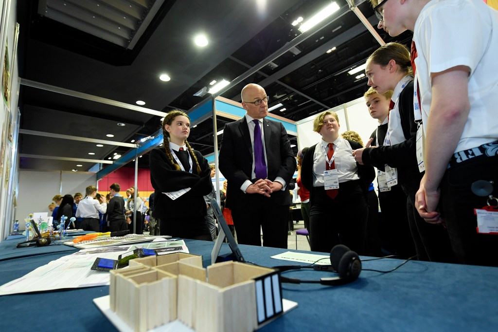 learners from Broughton High talk to the depute first minister about their design