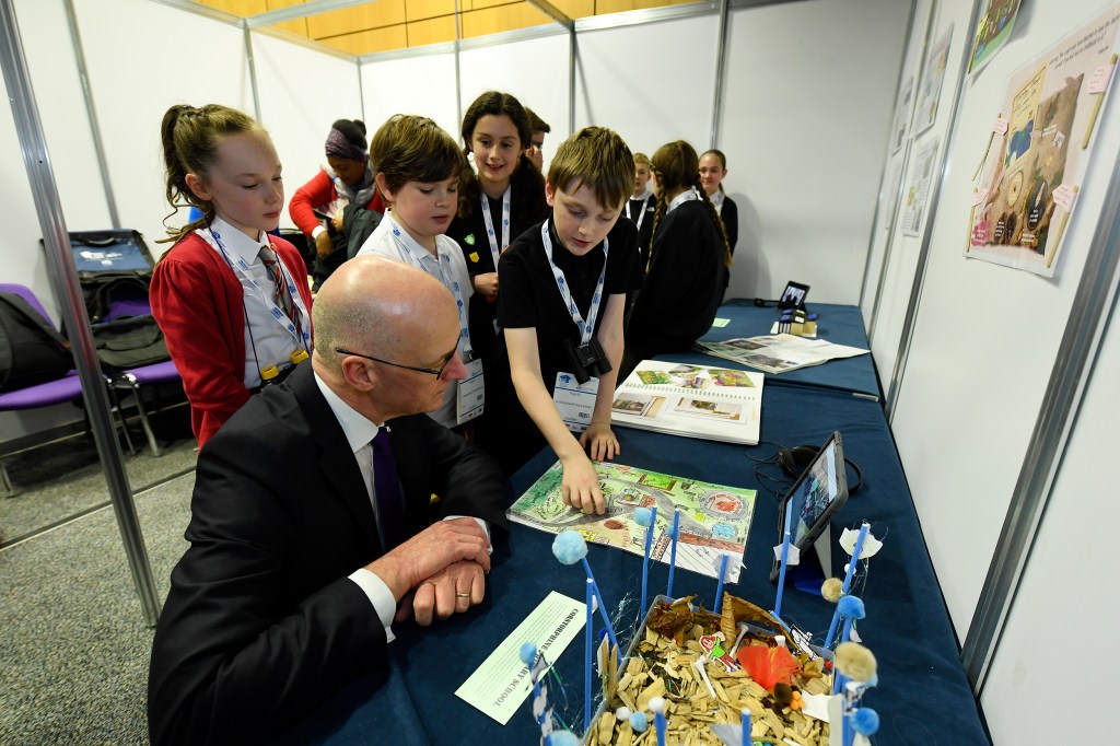 learners from Corstorphine Primary talk to the depute first minister about their design
