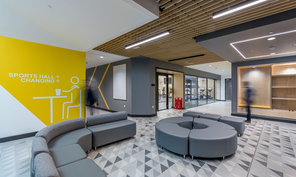 Waiting area with grey soft seating that can be moved to create different layouts