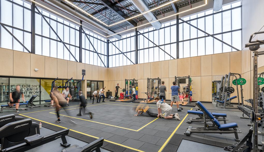 Students exercise in the fitness suite