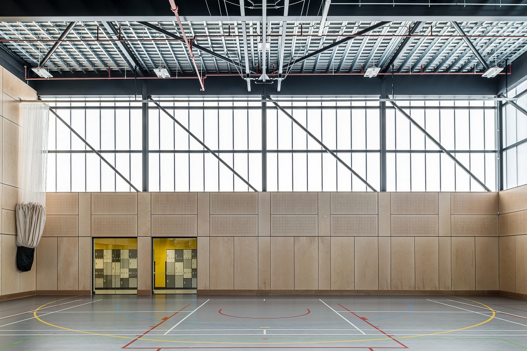The gym hall, half wooden panelling and half glazed